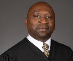 From farm fields to the appellate bench: The rise and record of Justice Thaddeus L. Wilson